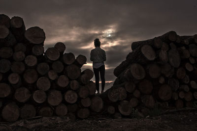 Woman standing on rock