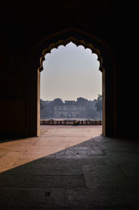 View of historical building through window