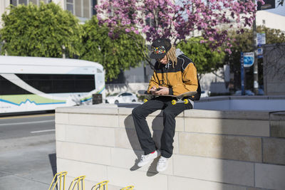 Young man and skateboard.