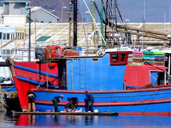 Boats moored in sea