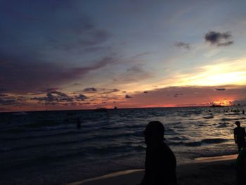 Scenic view of sea at sunset