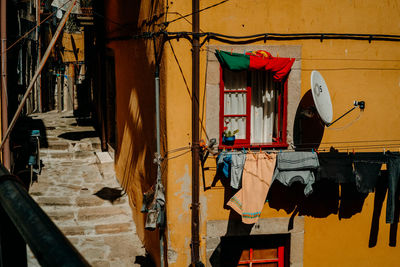 Clothes drying on wall against building