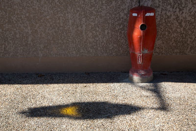 Close-up of fire hydrant on sidewalk