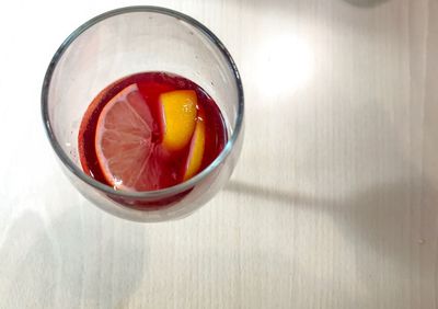 High angle view of drink in glass on table