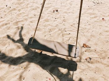 High angle view of shadow on sand