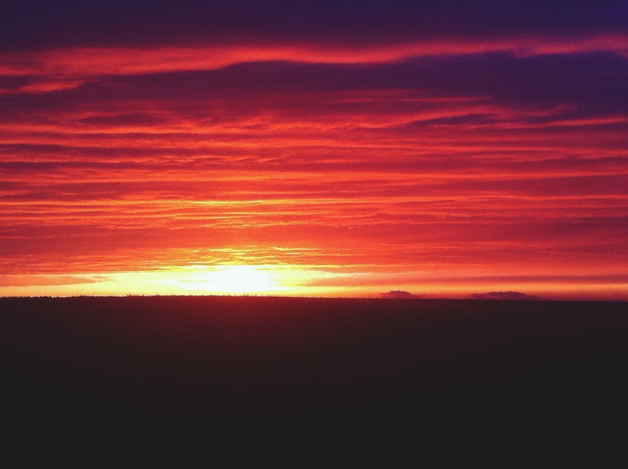 sunset, orange color, scenics, sky, beauty in nature, tranquil scene, tranquility, cloud - sky, idyllic, silhouette, dramatic sky, sun, nature, cloudy, cloud, landscape, majestic, moody sky, atmospheric mood, outdoors