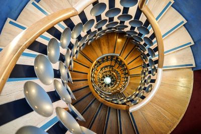 Directly below shot of spiral staircase in building