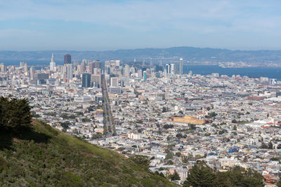 High angle view of buildings against sky in city