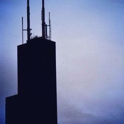 Low angle view of built structure against blue sky