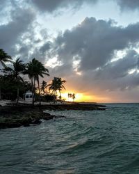 Scenic view of sea against cloudy sky