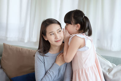 Portrait of mother and daughter