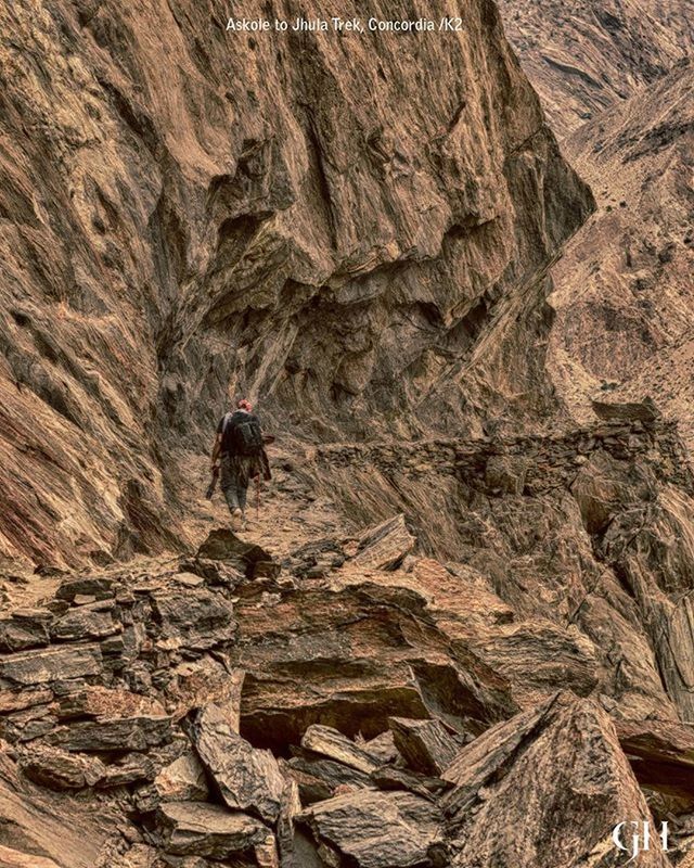 leisure activity, full length, lifestyles, rock - object, men, adventure, hiking, nature, rock formation, tranquility, rear view, tree, low angle view, textured, rock, climbing, beauty in nature, person