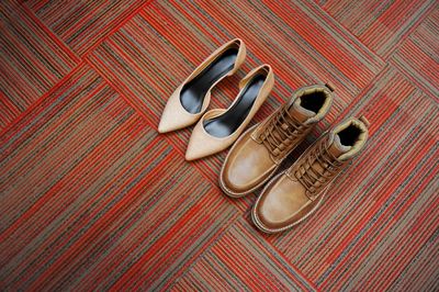 High angle view of shoes on wooden table