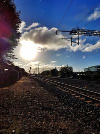 View of railway tracks at sunset