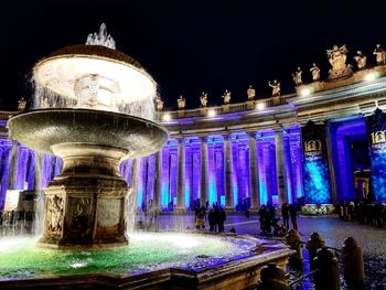 Low angle view of illuminated historical building at night