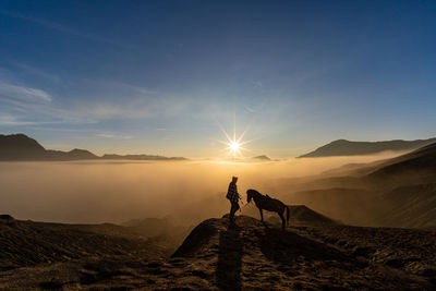 Enjoying the sunrise at the top of bromo mountain, tengger - east java
