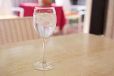 Close-up of wineglass on table