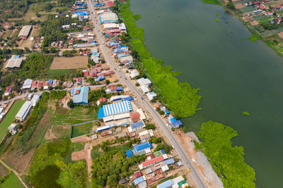 High angle view of river amidst buildings in city