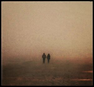 Silhouette people on foggy against sky