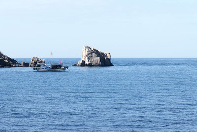 Scenic view of sea against clear sky