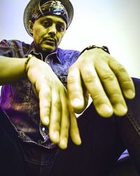 Low angle view of young man looking away