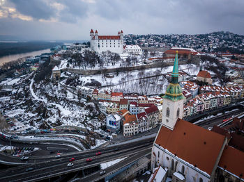 High angle view of buildings in city during winter