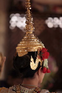 Rear view of traditional thai dancer