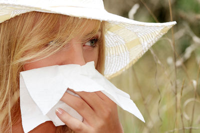 Close-up of girl wearing hat