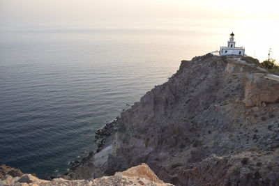 Scenic view of sea and rocks against sky