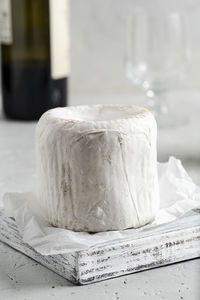 Front view if italian cheese. light background.