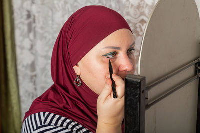 Young woman using mobile phone