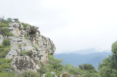 Scenic view of rocky mountains against sky