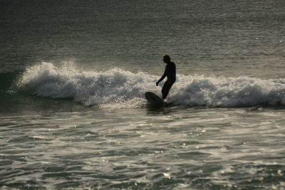 Man surfing in sea