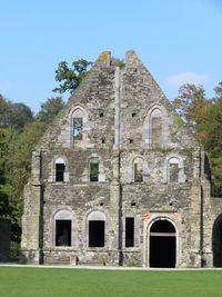 Exterior of historic abbey building against sky