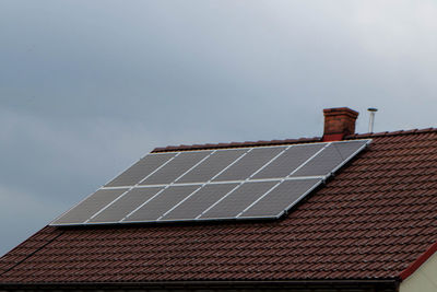 House roof with photovoltaic modules.