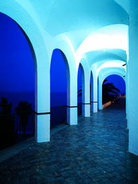 Illuminated corridor of building