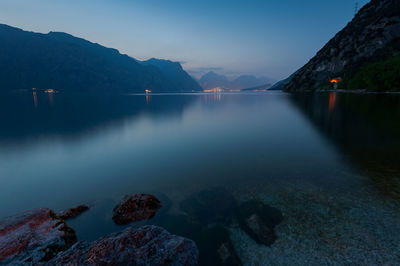 Scenic view of lake against blue sky