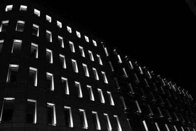Low angle view of illuminated building at night
