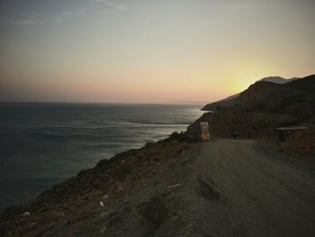 Scenic view of sea at sunset