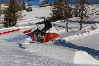 Person skiing on snow covered land