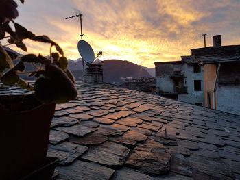 View of buildings in city during sunset