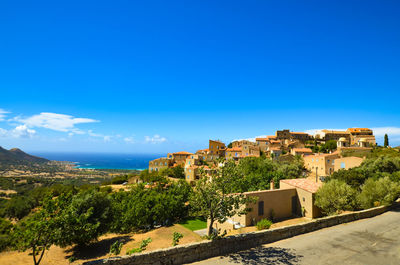 Residential district against clear sky