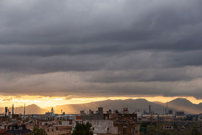 High angle view of townscape against sky at sunset