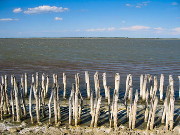 Scenic view of sea against cloudy sky