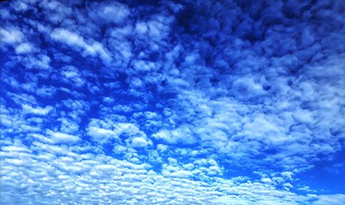 Low angle view of clouds in blue sky