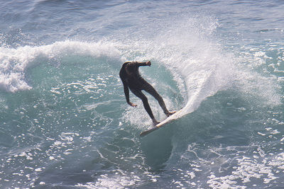 Man surfing in sea