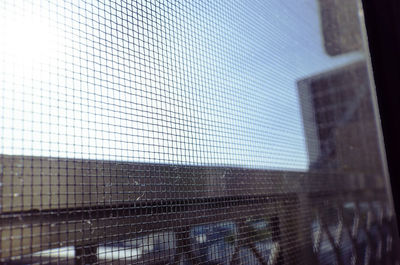 Digital composite image of modern building against sky