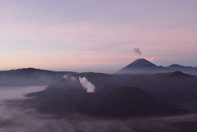 View of volcanic mountain during sunset