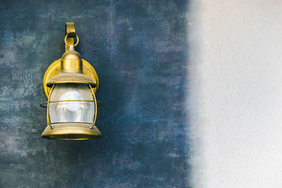 Lantern hanging on wall