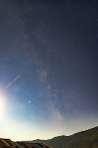 Low angle view of star field against sky at night